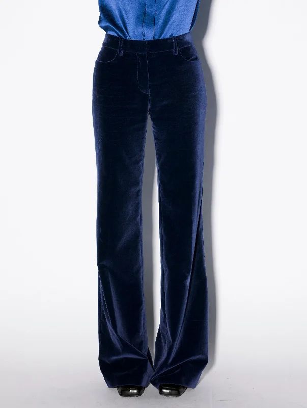 Flared blue velvet trousers