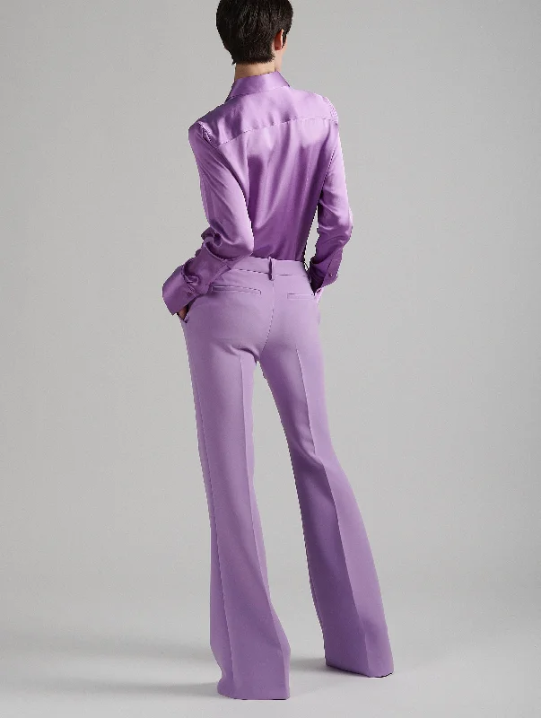 Flared trousers in lilac crepe